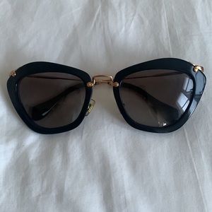 Miu Miu Black Cateye Sunglasses with Gold Hardware